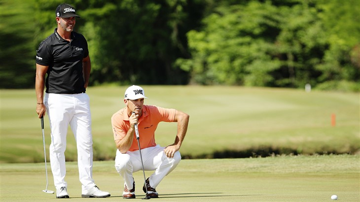 Scott Piercy and Billy Horschel line up a putt at the 2018 Zurich Classic of New Orleans